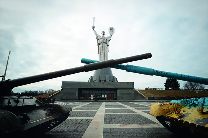 Massive explosions were heard near Kyiv, and street fighting broke out early Sunday in the second-biggest city, Kharkiv.