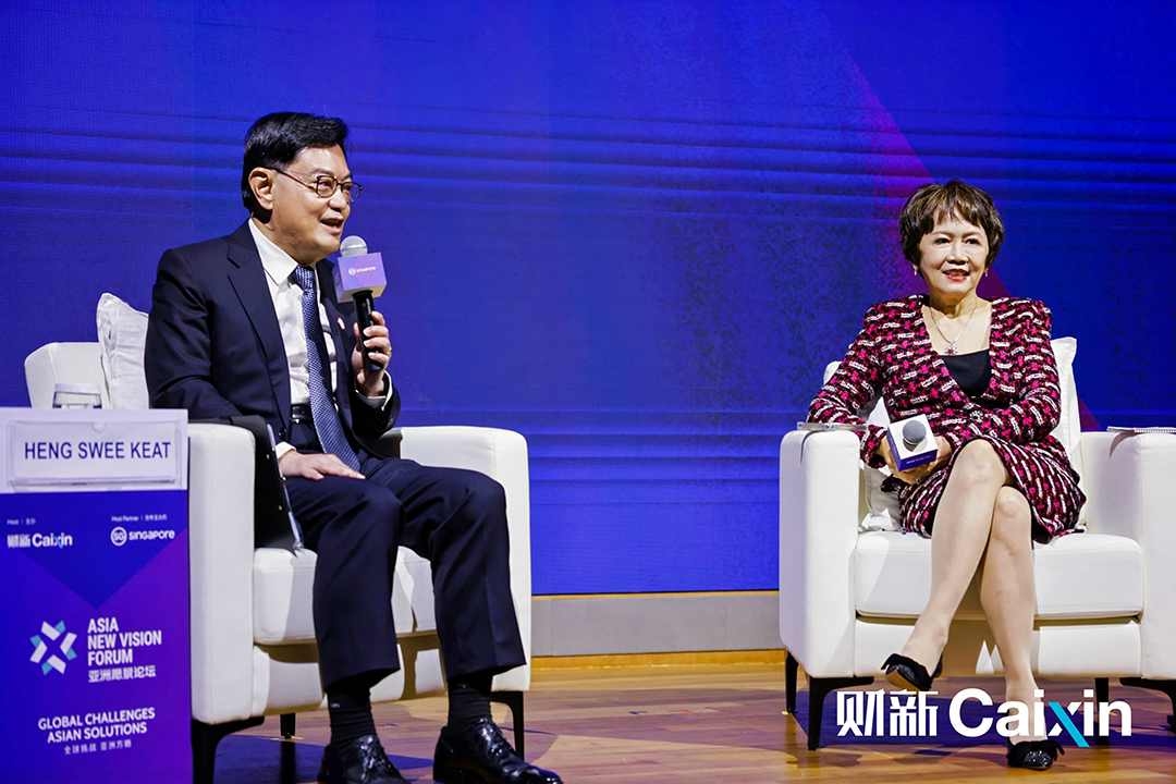 Singapore Deputy Prime Minister Heng Swee Keat speaks with Caixin Media Publisher Hu Shuli at the Asia New Vision Forum 2024 in Singapore on Wednesday. Photo: Caixin