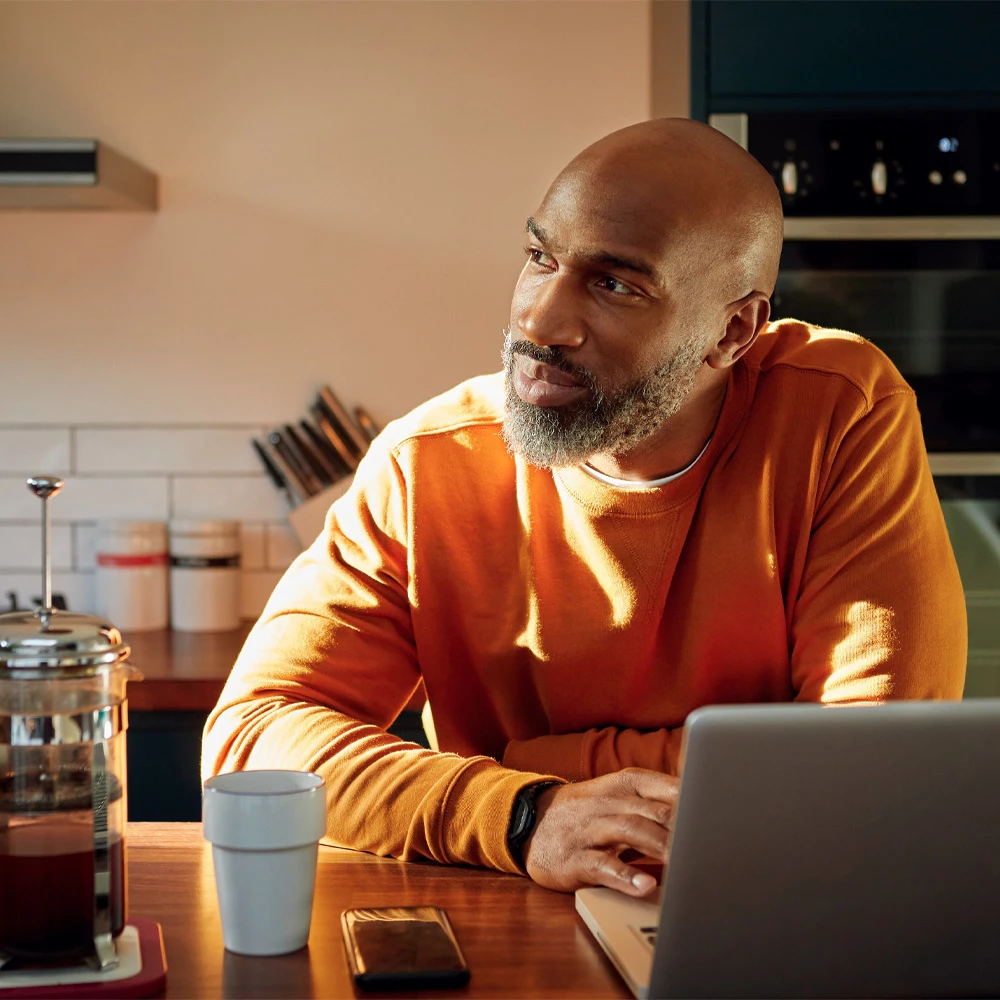 Man looking into the distance pondering